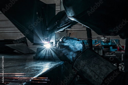 A welder in action in a workshop