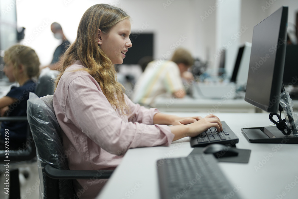 Children learning AI technology Robot with artificial intelligence system on its about the artificial intelligence during science lesson. Children learning AI technology Robot with artificial intelligence system on its about the artificial intelligence during science lesson.