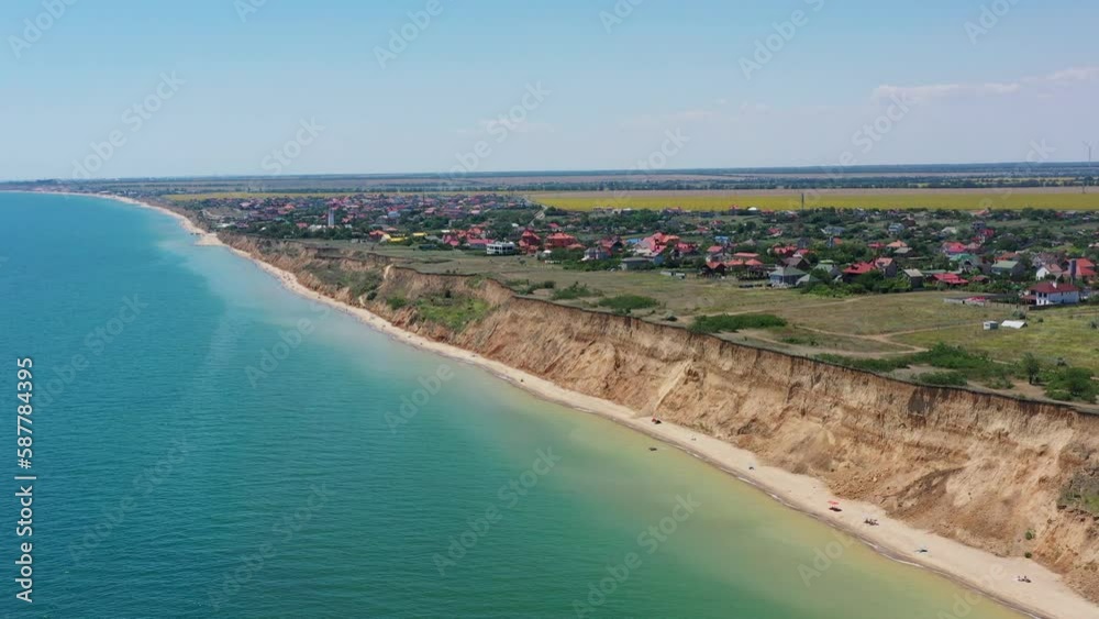 Panorama of sea shore in South Ukraine, Europe. Resort city with nice sand beach and clear blue sea. travel destination, ideal place for comfort vacation on black Sea. Drone video. Panorama of sea shore in South Ukraine, Europe. Resort city with nice sand beach and clear blue sea. travel destination, ideal place for comfort vacation on black Sea. Drone video.