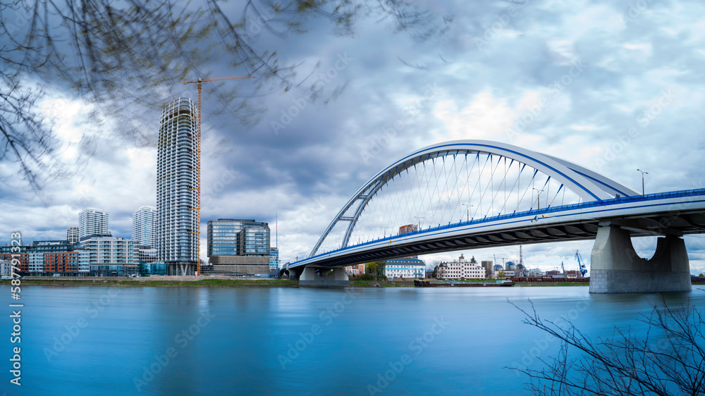 Fototapeta premium Old Bridge, or Starý most over the Danube, dedicated pedestrian and cycle paths with views of Old Town skyline in Bratislava, Slovakia
