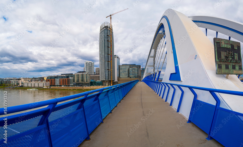 Naklejka premium Old Bridge, or Starý most over the Danube, dedicated pedestrian and cycle paths with views of Old Town skyline in Bratislava, Slovakia