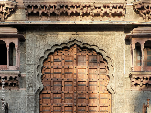 Carved Arches & Windows of fort wall of Rajwada, Indore, Madhya Pradesh. Also known as the Holkar Palace or Old Palace. Indian Architecture.
