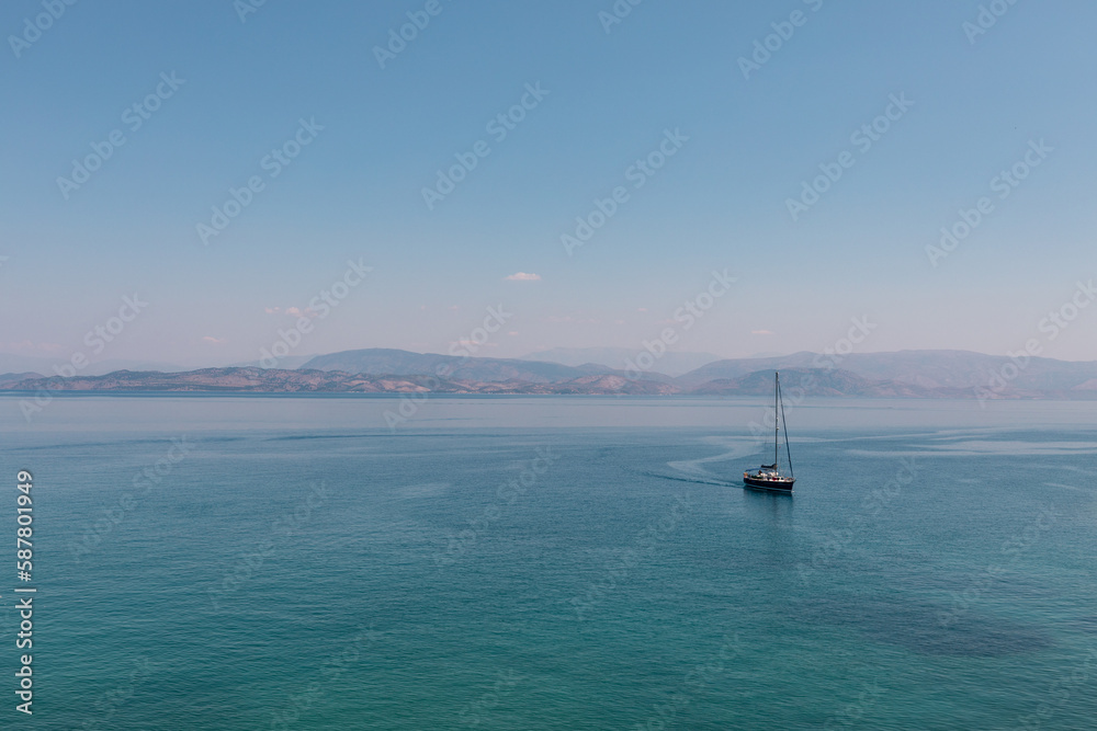 Boat near Old Venetian Fortress, Corfu, Greece Boat near Old Venetian Fortress, Corfu, Greece