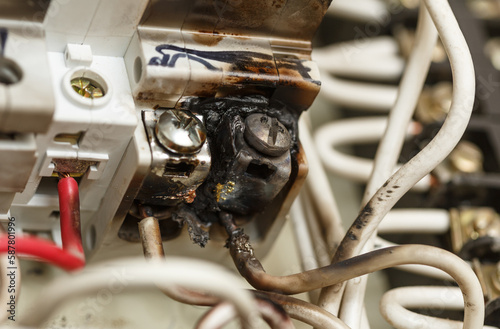 Burnt contacts of electric switchgear equipment.