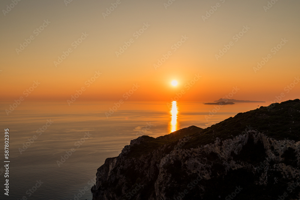 Amazing sunset seen from Angelokastro hill, Corfu, Greece