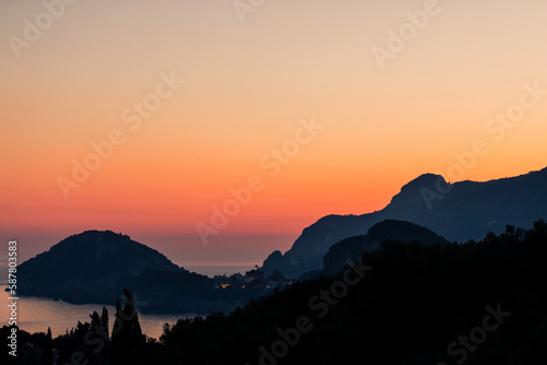 Beautiful red sunset over Liapades Beach, Corfu, Greece