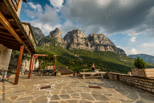 Girl relaxing in near Vikos Gorge in Vikos National Park, Greece
