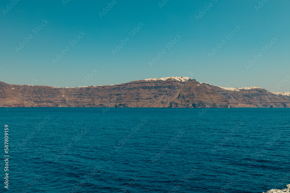 Santorini, Grece - July 23, 2020 - White houses of Imerovigli on the top of Santorini caldera