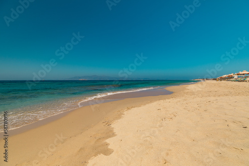 Fototapeta Naklejka Na Ścianę i Meble -  Beautiful empty beach on Naxos Island with turquoise Mediterranean sea 