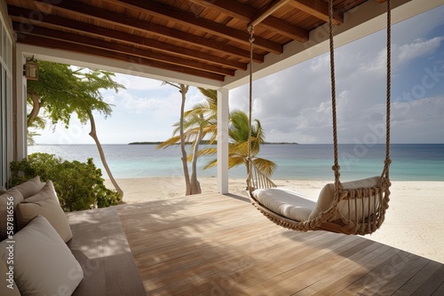luxury house veranda with hanging swing and beach view photo