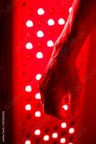 Far Infared Light Therapy on the Arm and Hand © Pamela Au