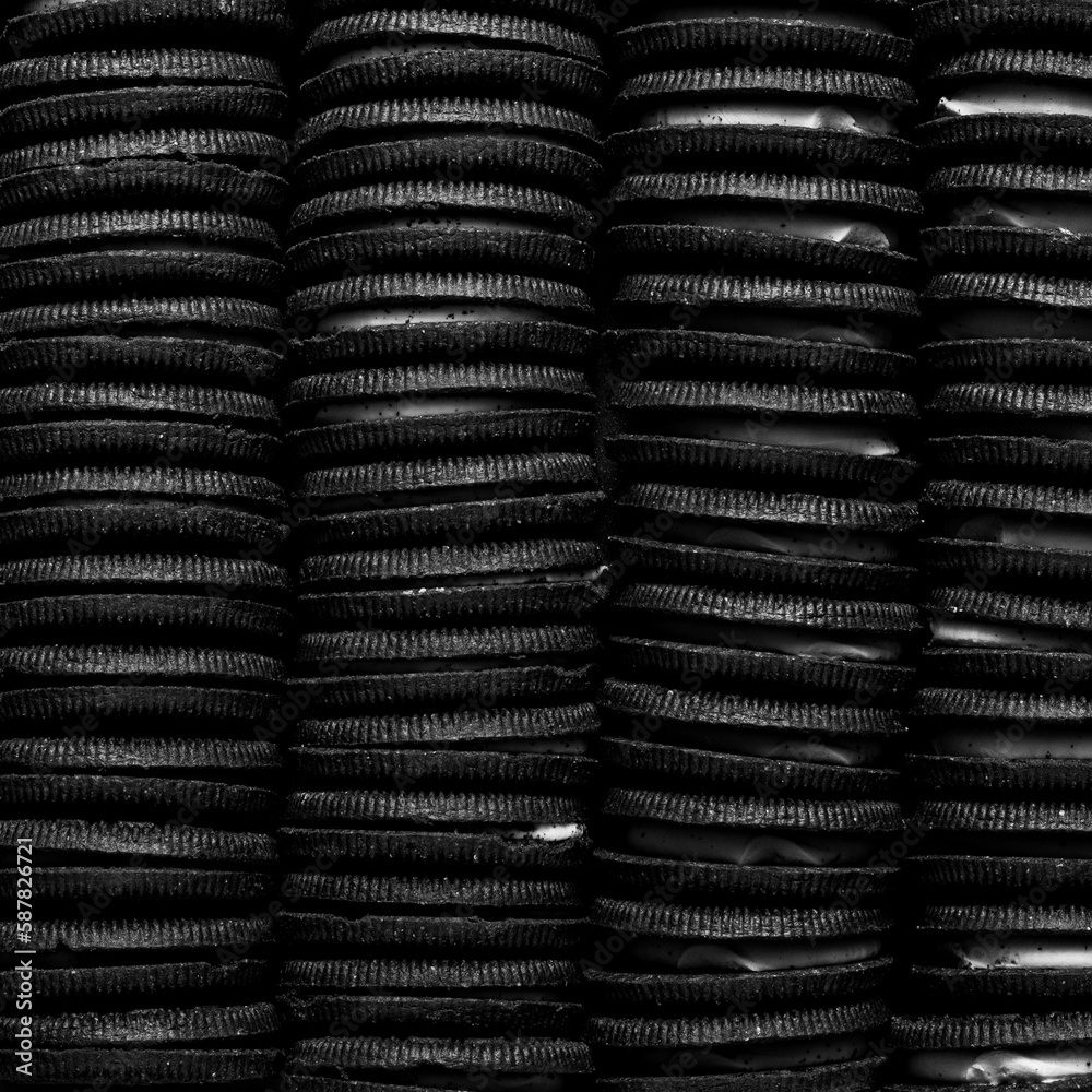 Rows of chocolate sandwich cookies Rows of chocolate sandwich cookies
