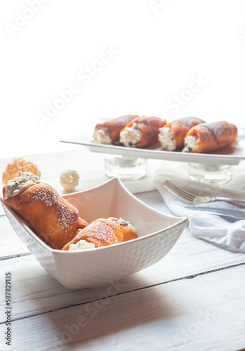 Cannoli with dark chocolate and dried fruits