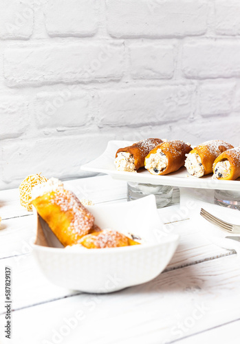 Cannoli with dark chocolate and dried fruits