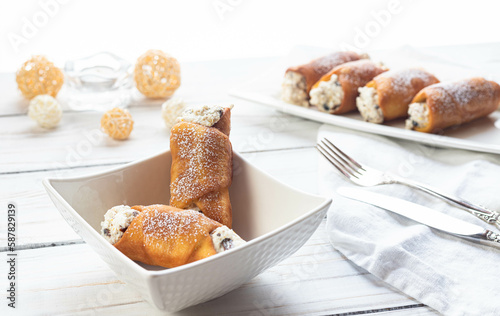 Cannoli with dark chocolate and dried fruits