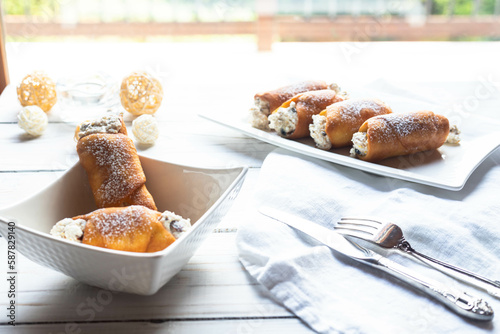 Cannoli with dark chocolate and dried fruits
