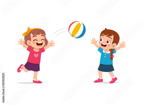 little kid playing volley ball with friend and feel happy