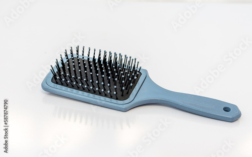 Hairstyling hair brush on white isolated background