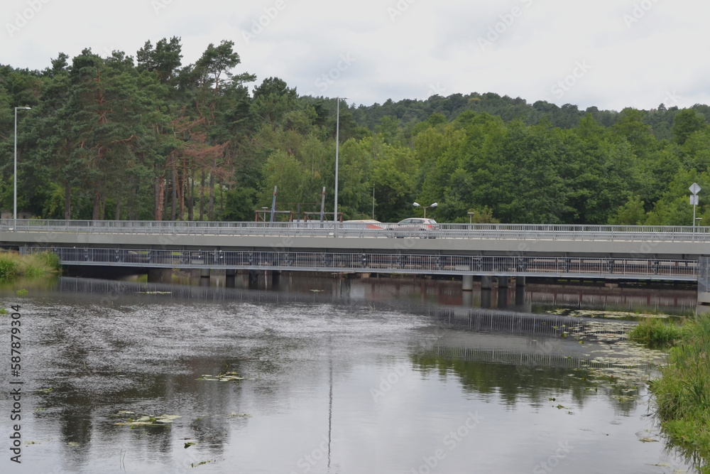 New transport and pedestrian bridge across the small river Voke. Vilnius, Lithuania.