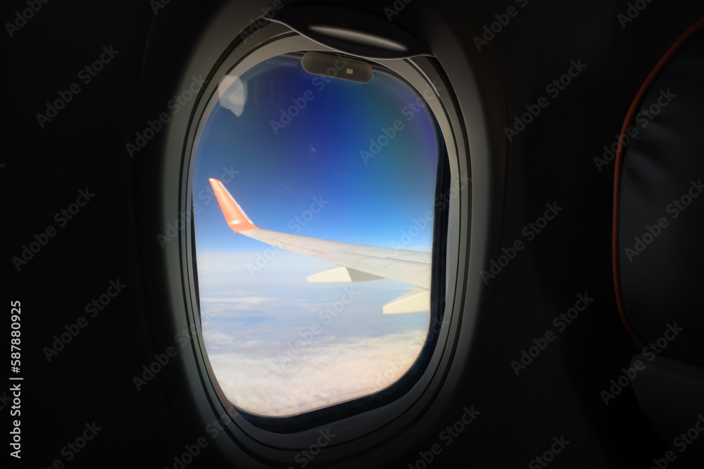 interior of the aircraft, a row of seats in the flight of the aeroplane interior of the aircraft, a row of seats in the flight of the aeroplane