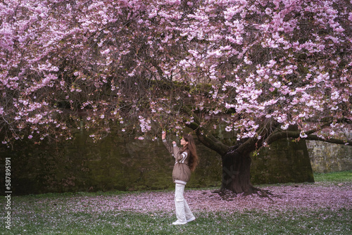 girl in blossoms in spring