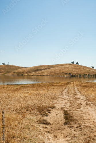 Golden dried out landscape of Lake Eildon at the end of summer