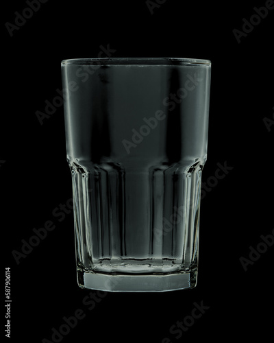 Obraz na płótnie Empty faceted glass isolated on black background. Closeup. w salonie