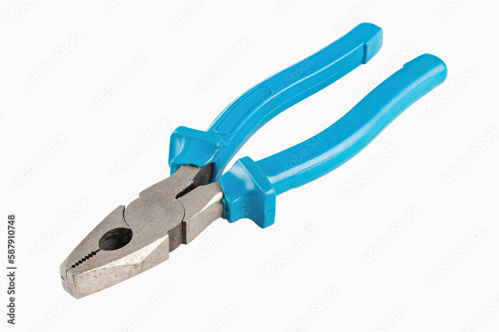 One new metal pliers with rubber handles blue color isolated on white background. Side view. Repair or building concept. One new metal pliers with rubber handles blue color isolated on white background. Side view. Repair or building concept.