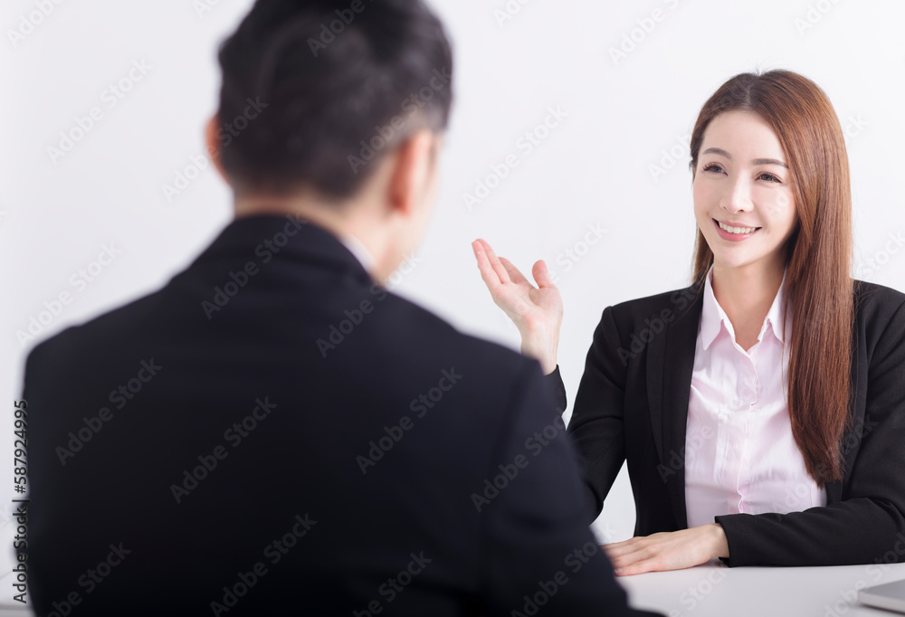 Business manager interviewing young women job applicant in the office Business manager interviewing young women job applicant in the office