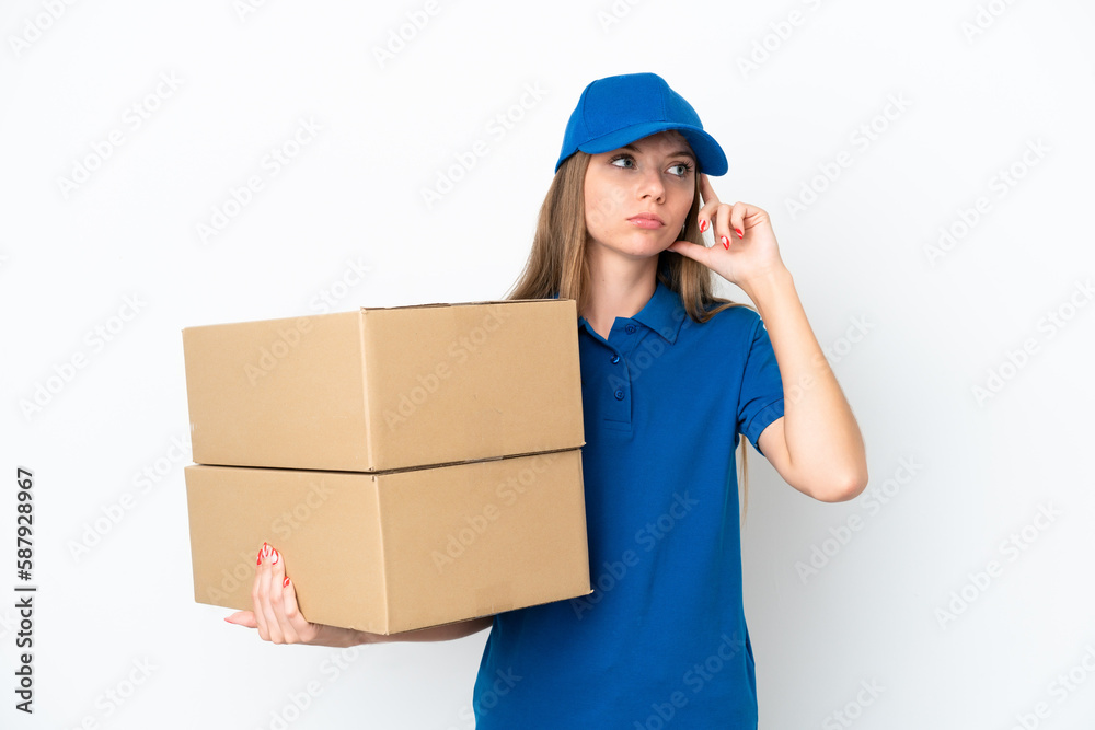 Delivery Lithuanian woman isolated on white background having doubts and thinking Delivery Lithuanian woman isolated on white background having doubts and thinking
