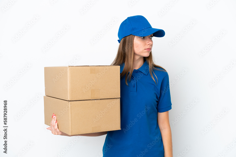 Delivery Lithuanian woman isolated on white background looking to the side Delivery Lithuanian woman isolated on white background looking to the side