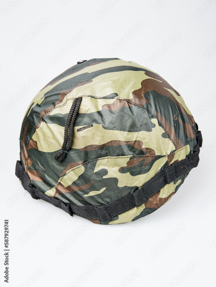 Fototapeta premium Camouflage, green, khaki military helmet, isolated white background