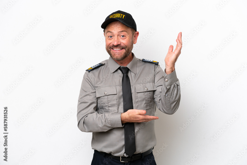 Middle age security man isolated on white background extending hands to the side for inviting to come Middle age security man isolated on white background extending hands to the side for inviting to come