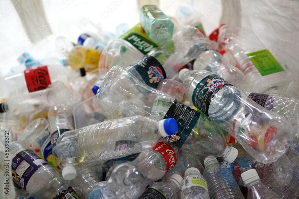 PENANG, MALAYSIA 2 APR 2023 Plastic bottles waste in big bag at recycle center. Plastic