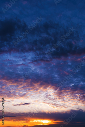 Wonderful fluffy clouds at sunset sky, colorful landscape as natural background