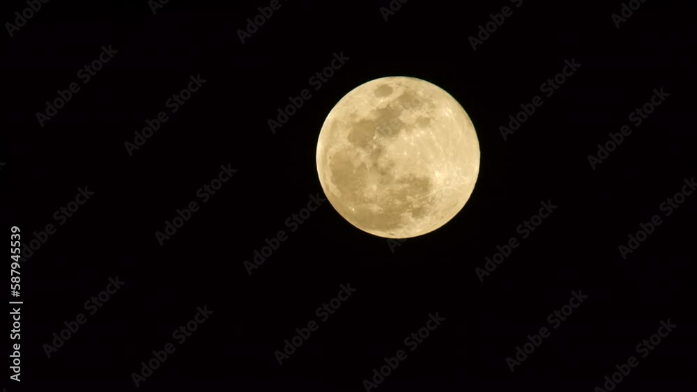Timelapse Lockdown Of A Rising Full Moon Against A Black Background - Los Angeles, California Timelapse Lockdown Of A Rising Full Moon Against A Black Background - Los Angeles, California