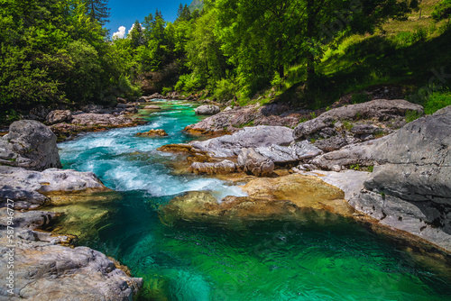 Emerald color Soca river with rocky shoreline  Bovec  Slovenia