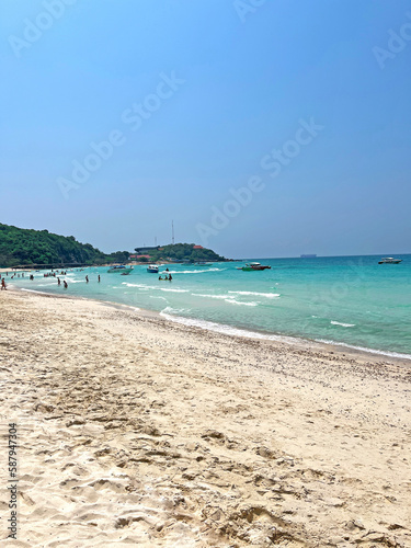 holiday style beautiful seascape landscape view with swim tourist and swimmer also have boat and yacht and jet ski on blue sea ocean wave in nature sand beach sky island background
