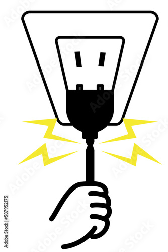 コンセントから電源プラグを抜くときに電源コードを引っ張ってしまい、断線して火花が飛び散る様子