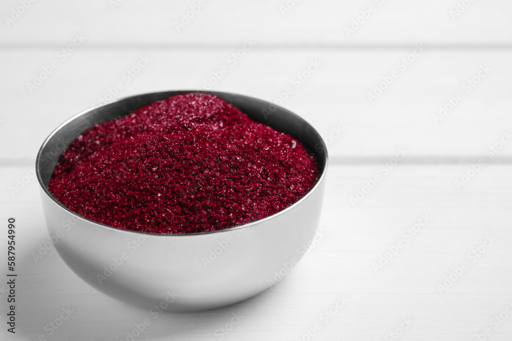 Bowl with dark red food coloring on white table, closeup. Space for text Bowl with dark red food coloring on white table, closeup. Space for text