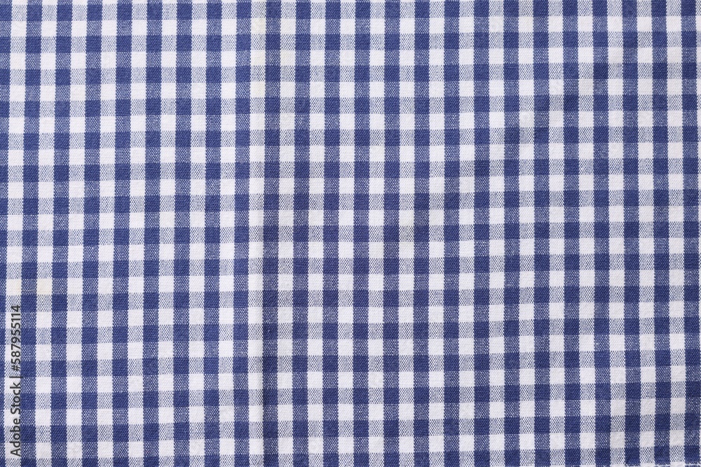 Blue checkered tablecloth as background, top view Blue checkered tablecloth as background, top view