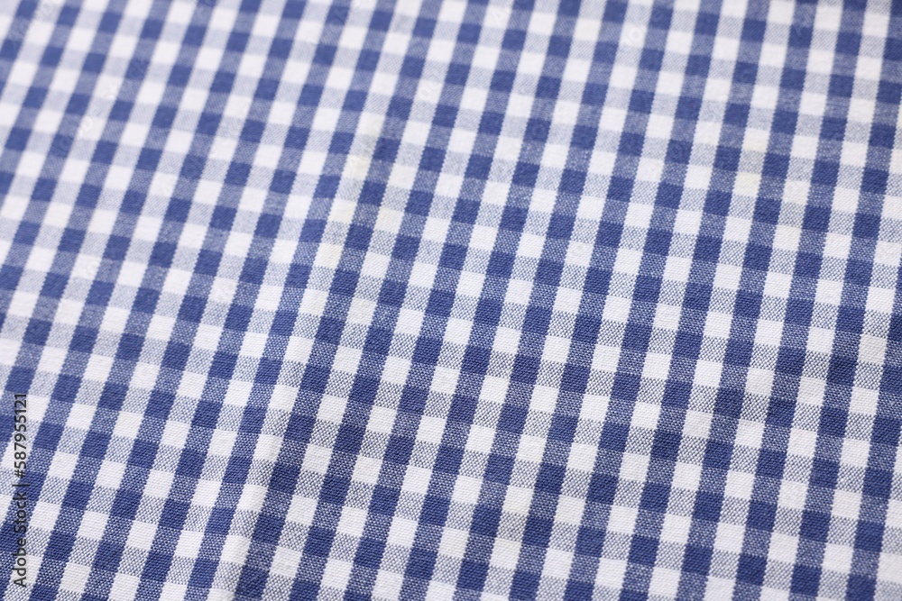 Blue checkered tablecloth as background, closeup view Blue checkered tablecloth as background, closeup view