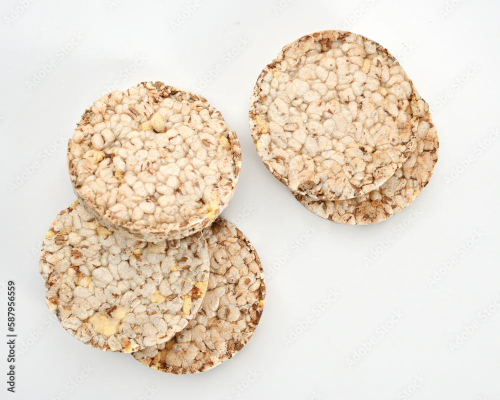healthy diet light and crispy bread without yeast from whole grains on a white background, close-up