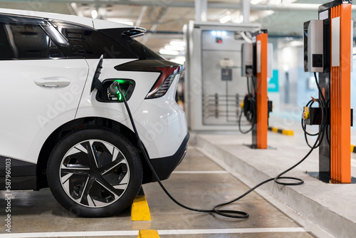 Charging of electric cars at a charging station, automotive industry, transportation