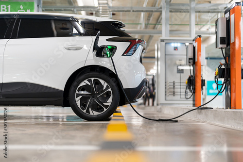 Charging of electric cars at a charging station, automotive industry, transportation