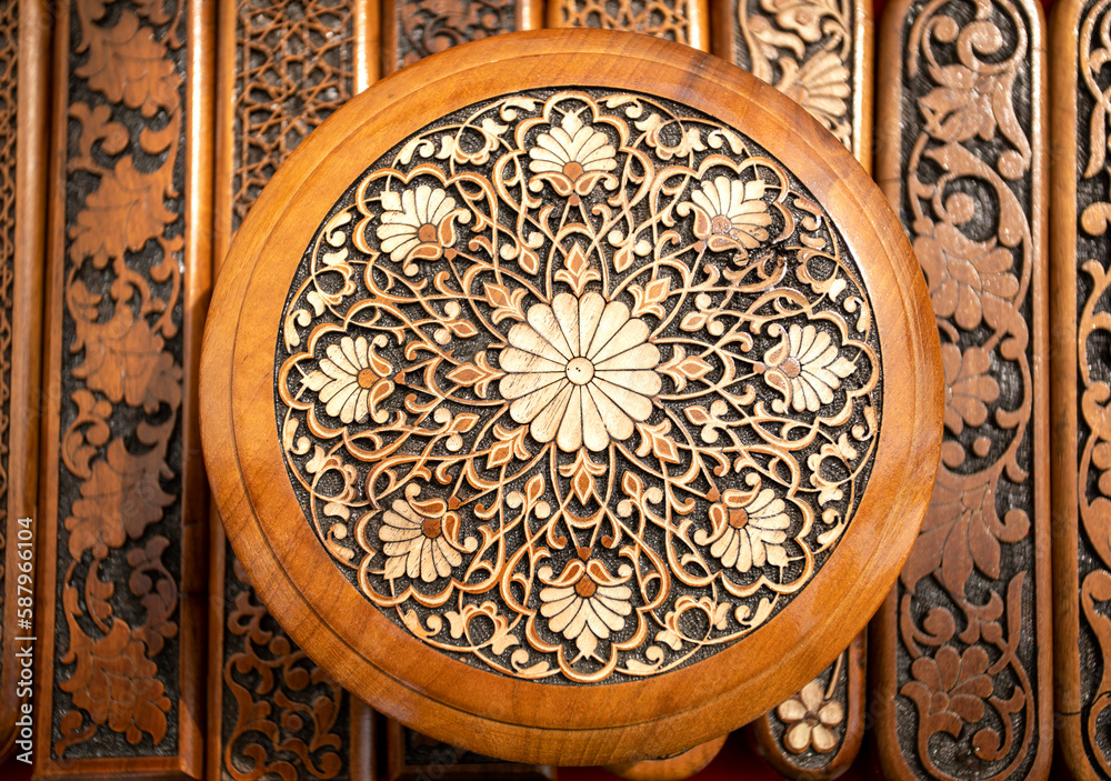 Carved floral ornament on a wooden box