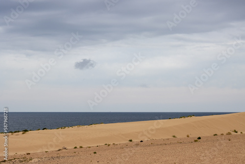 Desert and Atlantic ocean,, Corralejo, Spain