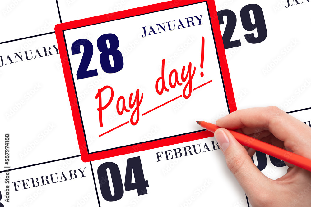 Hand writing text PAY DATE on calendar date January 28 and underline it. Payment due date Hand writing text PAY DATE on calendar date January 28 and underline it. Payment due date