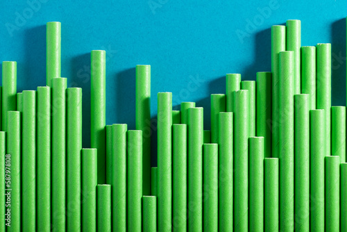 Close-up of green cardboard drinking straws