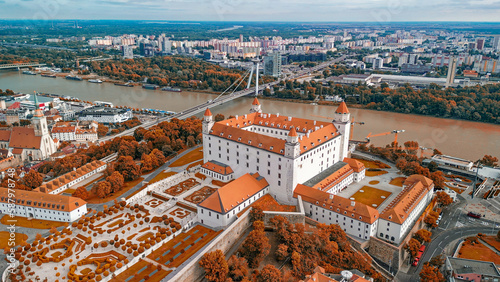 Photography Aerial view of Bratislava Castle and city skyline on a summer afternoon